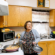 Maria Chavira cooks tortillas, eggs, and beans inside her home