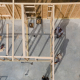 Members of the Delta Design Build Workshop crew frame a house in the Eastmoor Subdivision near Moorhead, Mississippi on Sept. 2, 2020.