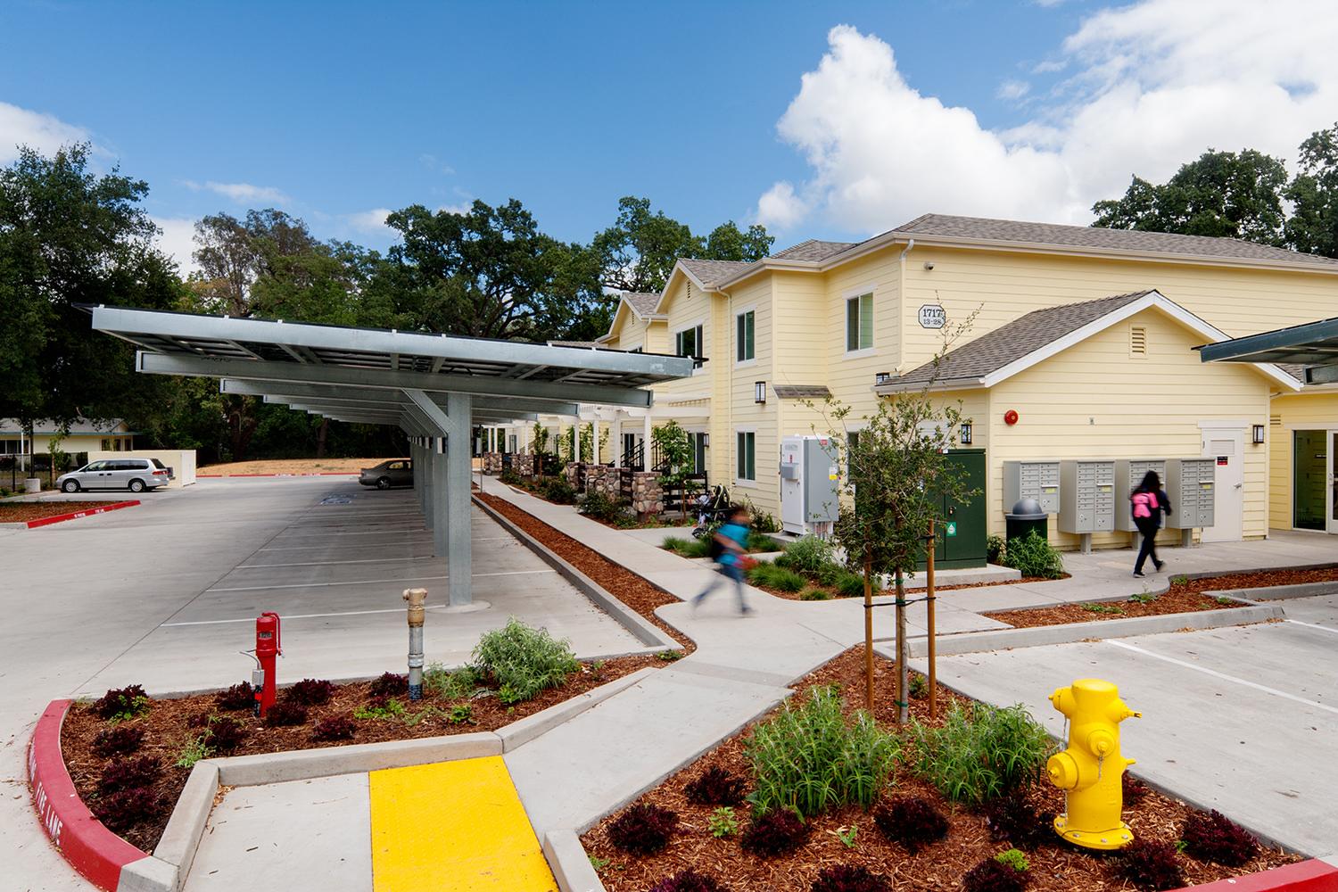 Solar panels covering parking spaces at Calistoga Family Apartments